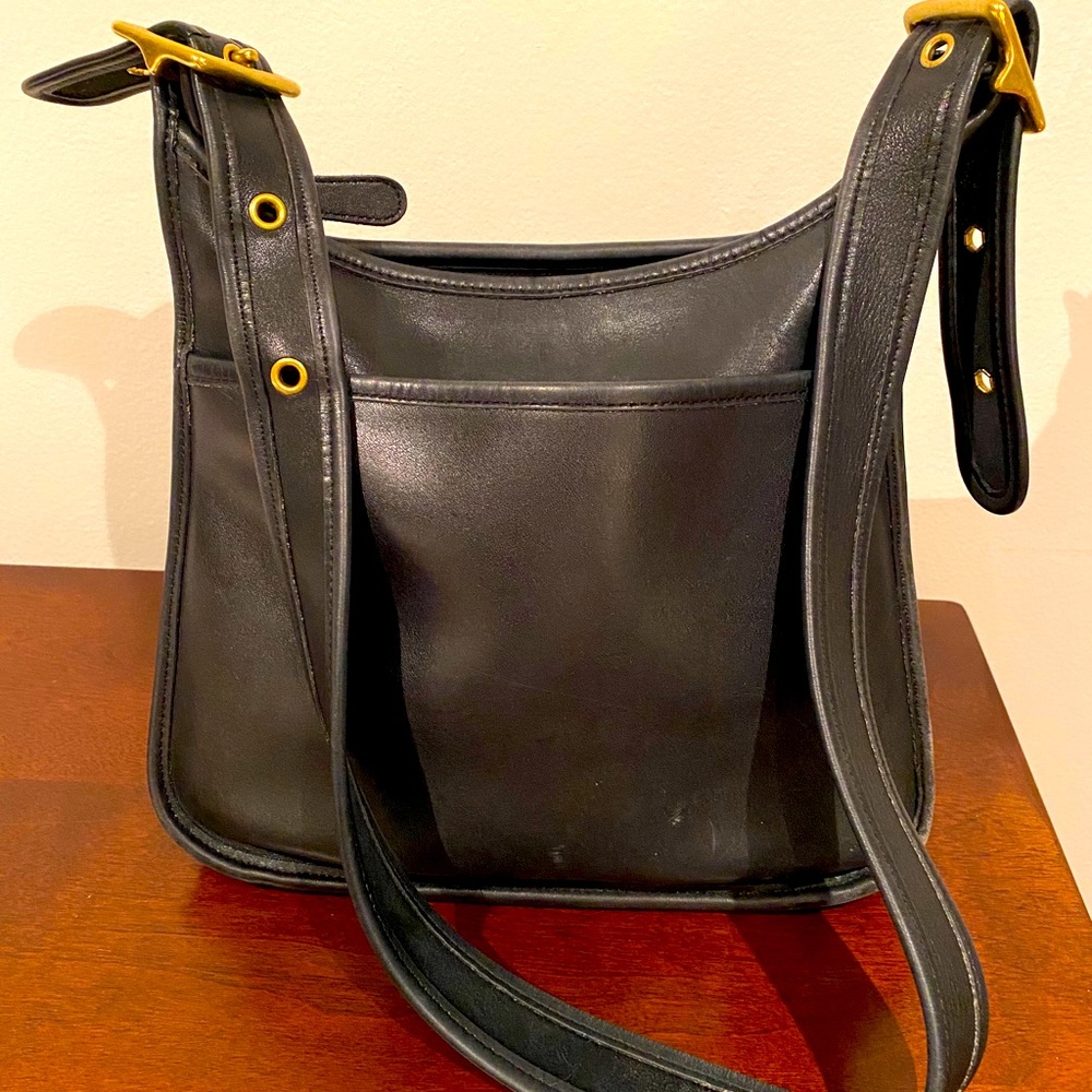 Coach purse with gold buckles